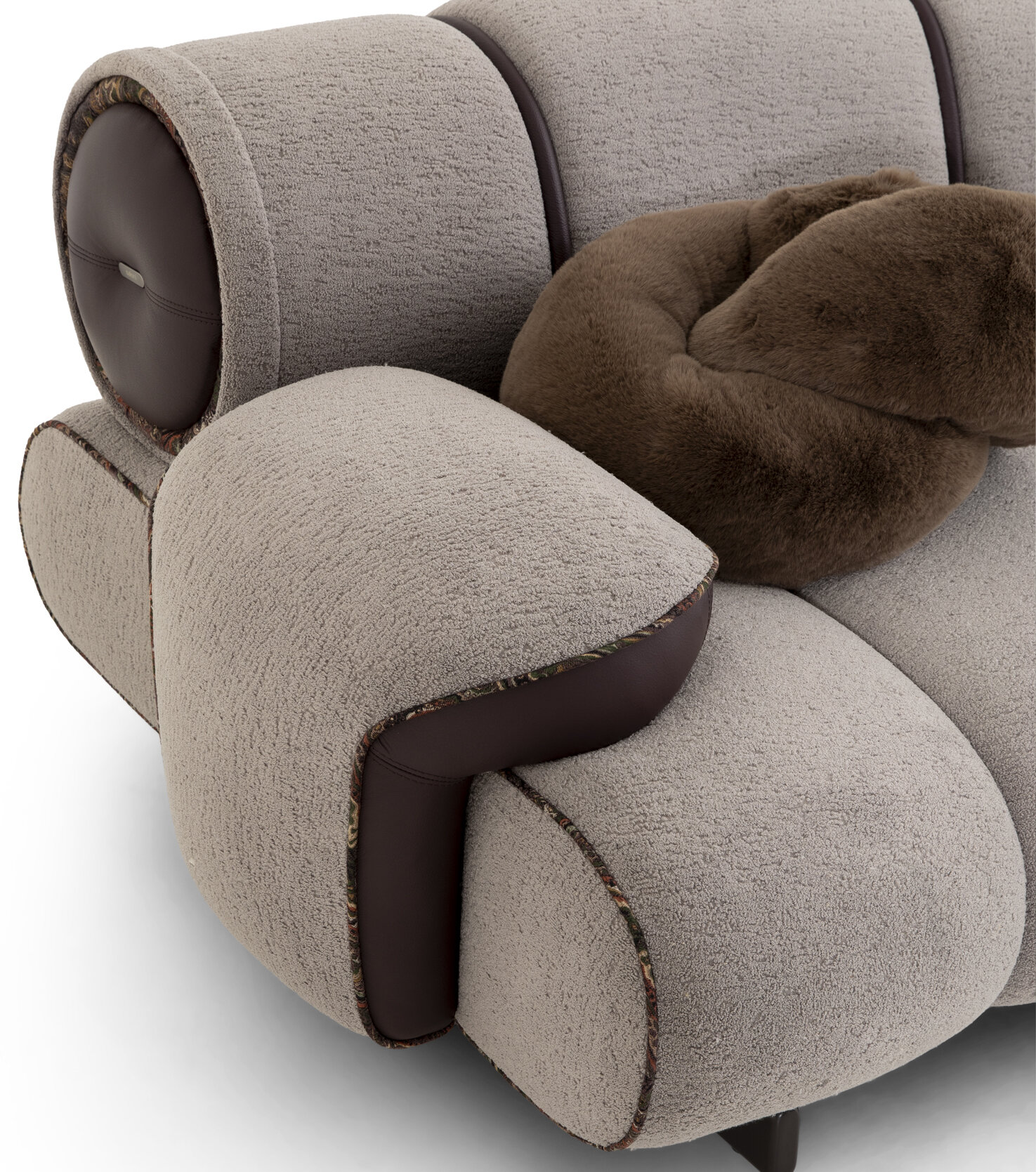 Luxurious beige textured sofa with dark leather accents, plush brown cushion, and contemporary design, perfect for modern living room decor.