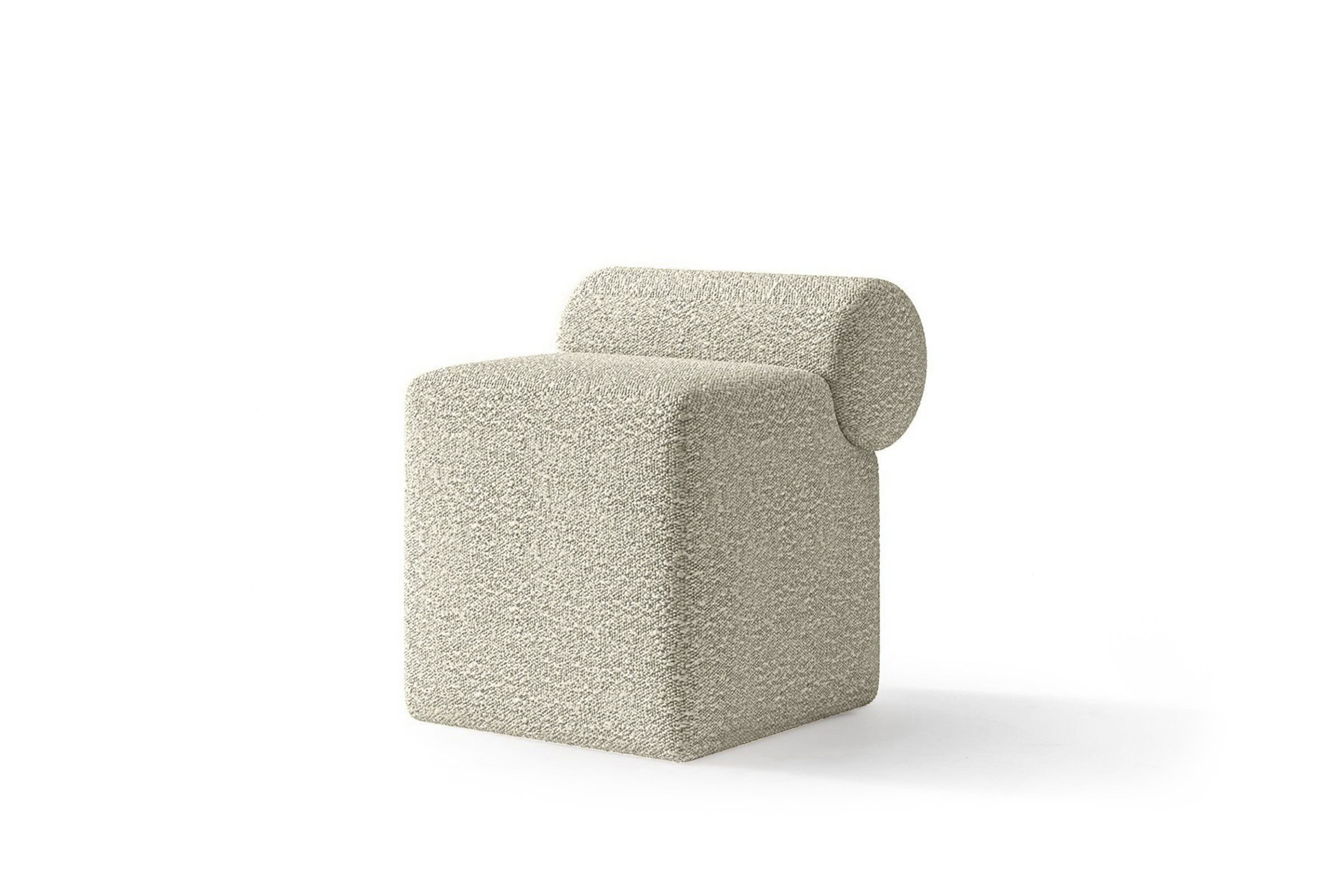 Sleek modern armchair with minimalist design, textured beige upholstery, and unique rounded backrest, ideal for contemporary living rooms and stylish interior decor.