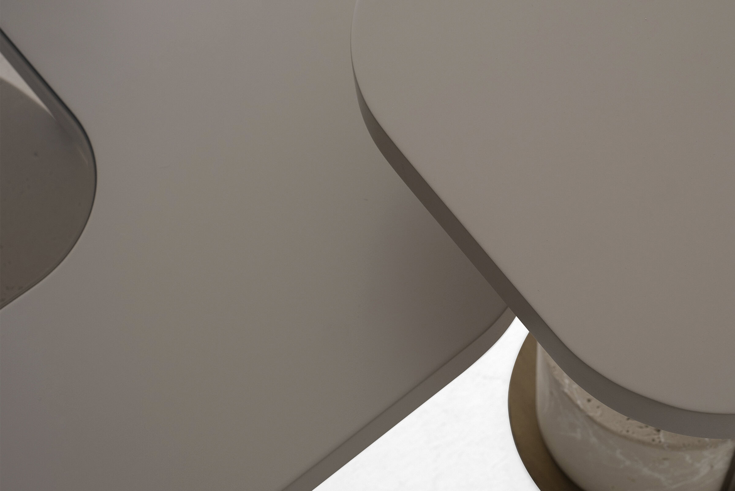 Sleek modern furniture close-up showcasing smooth, minimalist surfaces and elegant curves, perfect for contemporary living spaces and home decor.