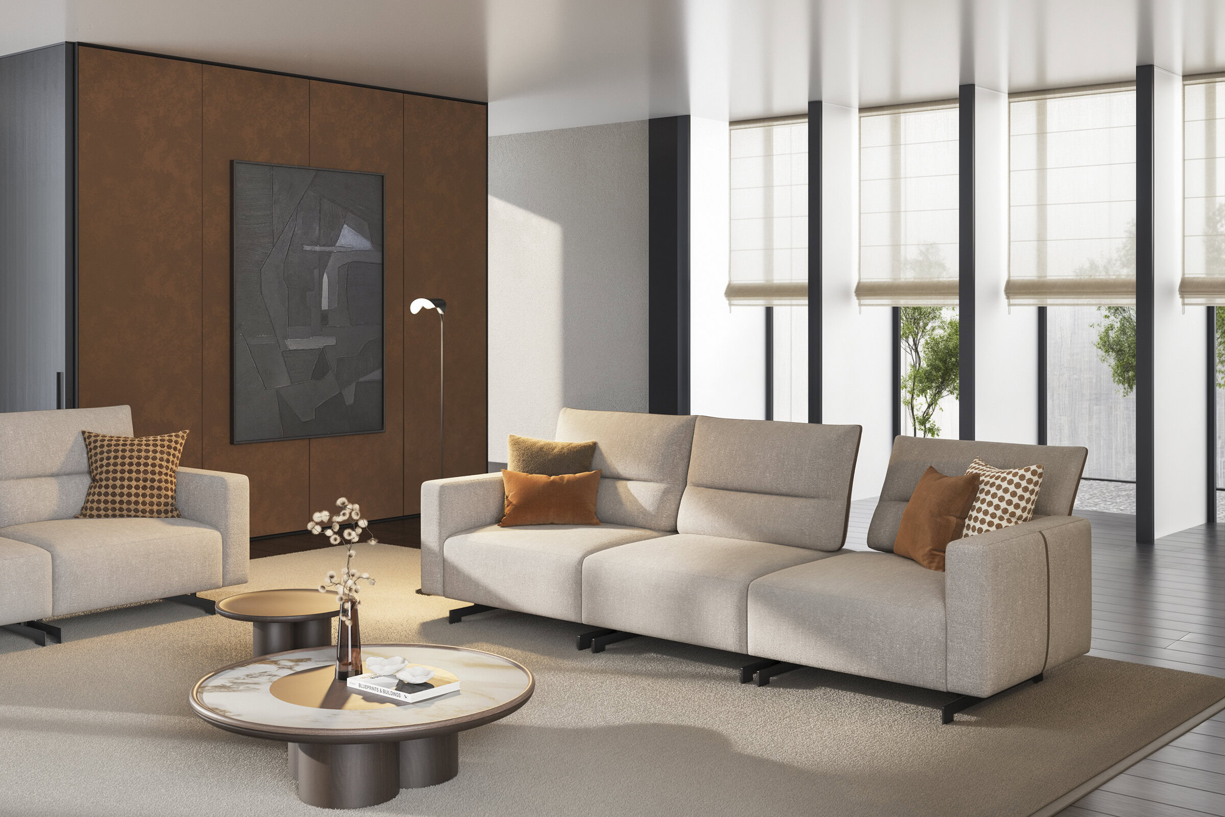 Contemporary beige sofa set with accent pillows in a stylish living room featuring large windows, natural light, and modern decor from Saloni Furniture. Perfect for home comfort and interior elegance.