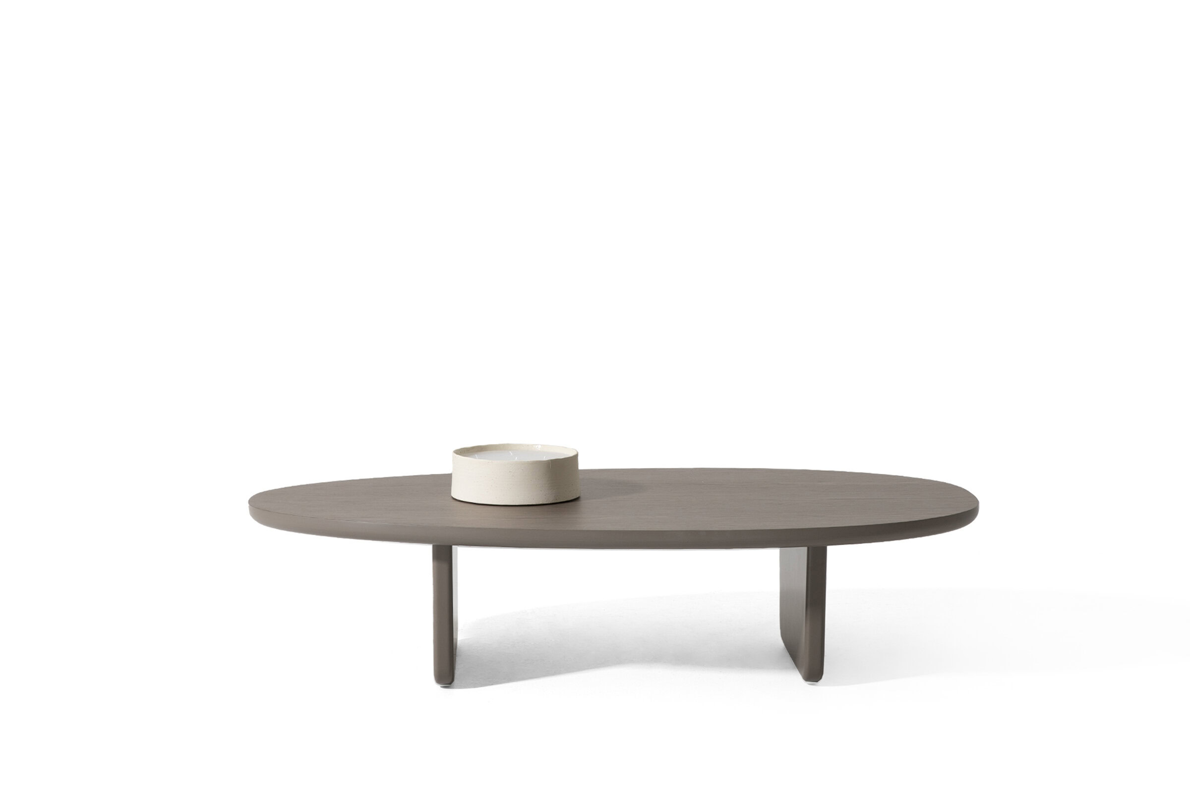 Sleek modern coffee table with an oval shape, wooden finish, and minimalist design, perfect for contemporary living room decor and stylish home interiors.