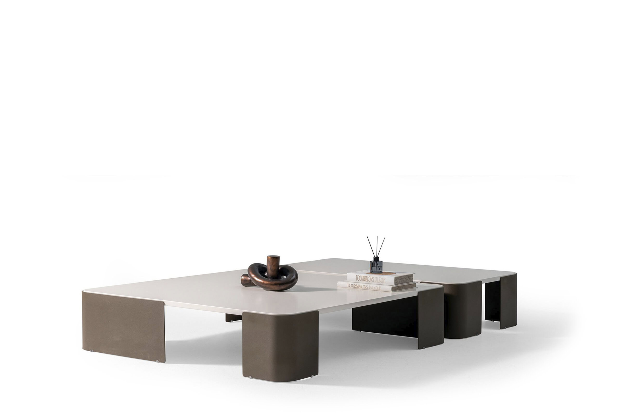 Contemporary modern coffee table with sleek design in neutral tones, featuring rounded edges and a minimalist aesthetic. Perfect for stylish living room decor.
