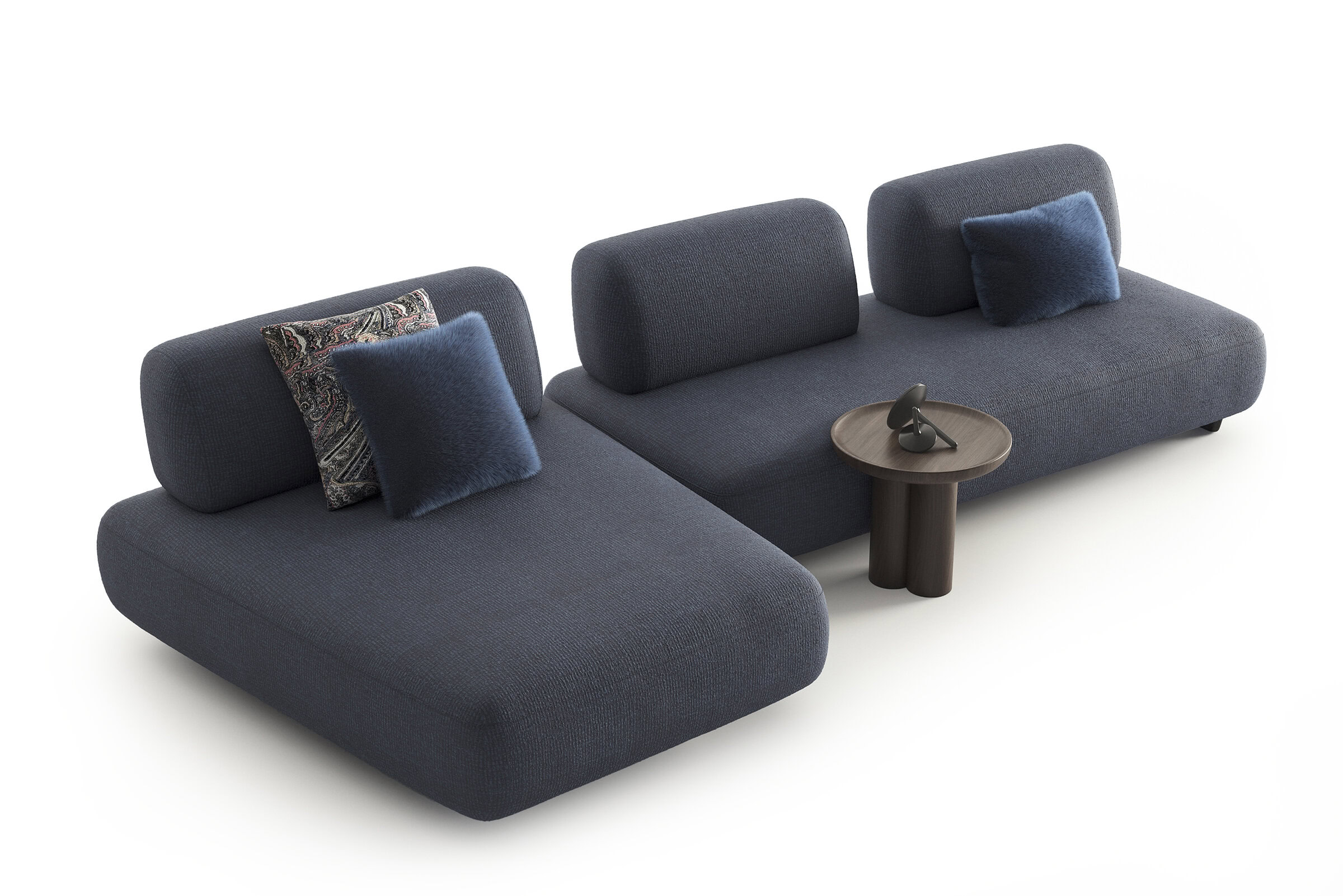 Contemporary dark gray modular sofa with plush cushions and a small side table, ideal for stylish living room seating and versatile interior design.