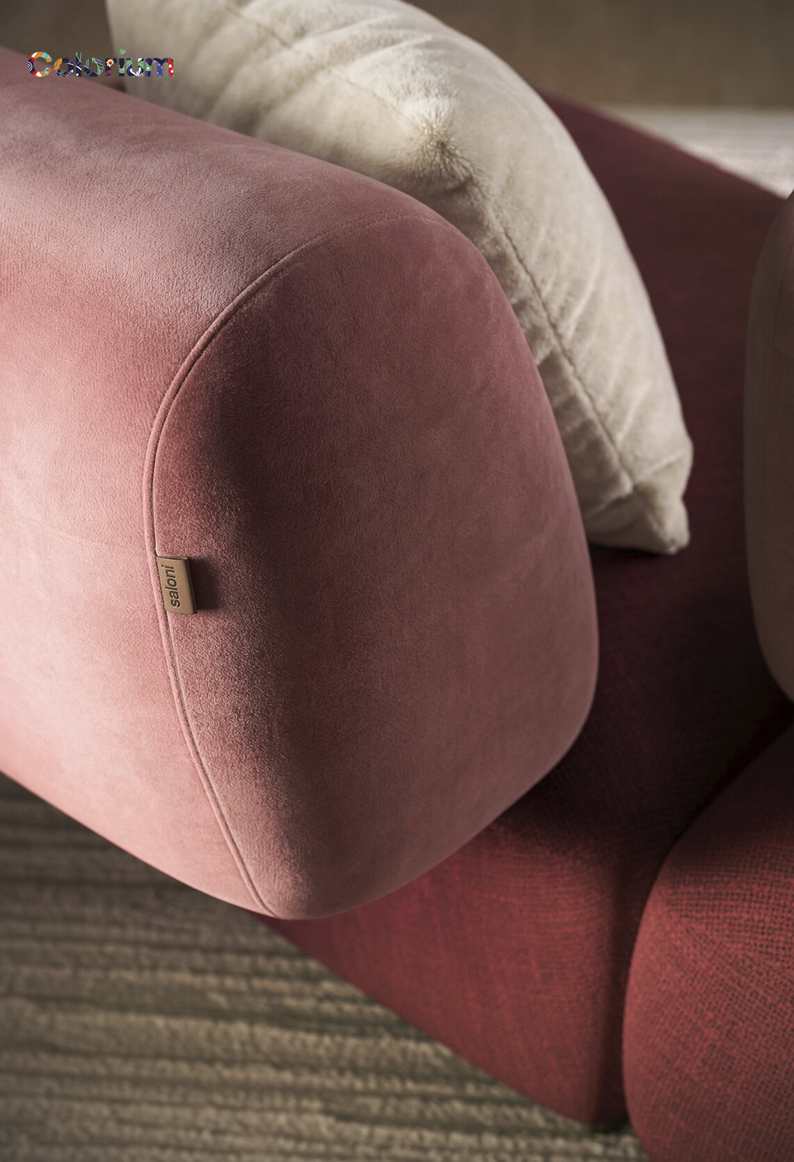 Elegant soft pink velvet armchair with rounded design, perfect for modern living rooms and cozy spaces. Crafted for comfort and style, adding a touch of luxury to your home decor.