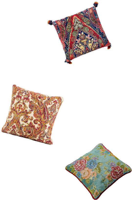 Colorful embroidered cushions with intricate patterns, perfect for adding a touch of elegance to living spaces.