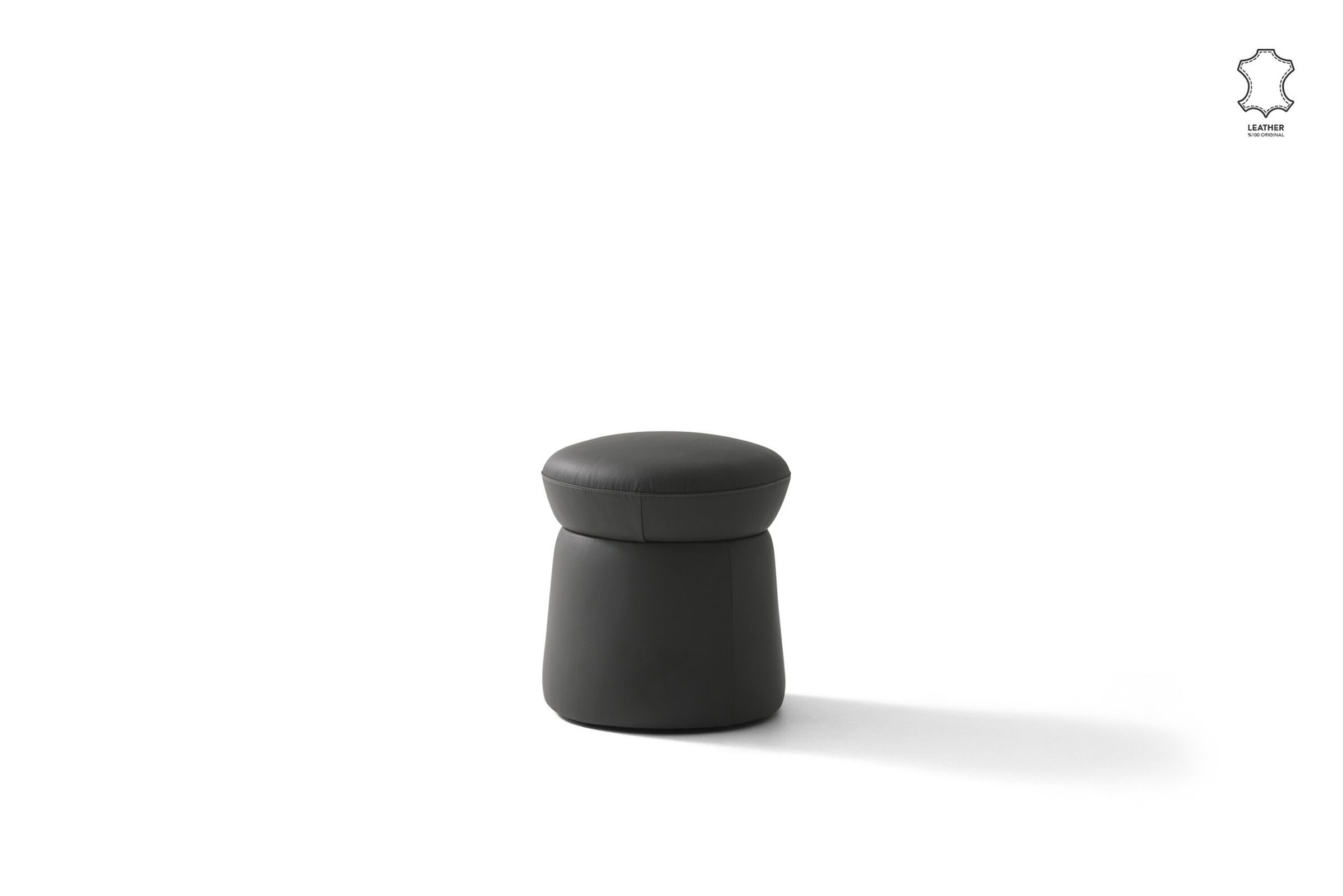 Contemporary black leather ottoman with smooth finish, versatile and stylish for modern home decor and furniture.