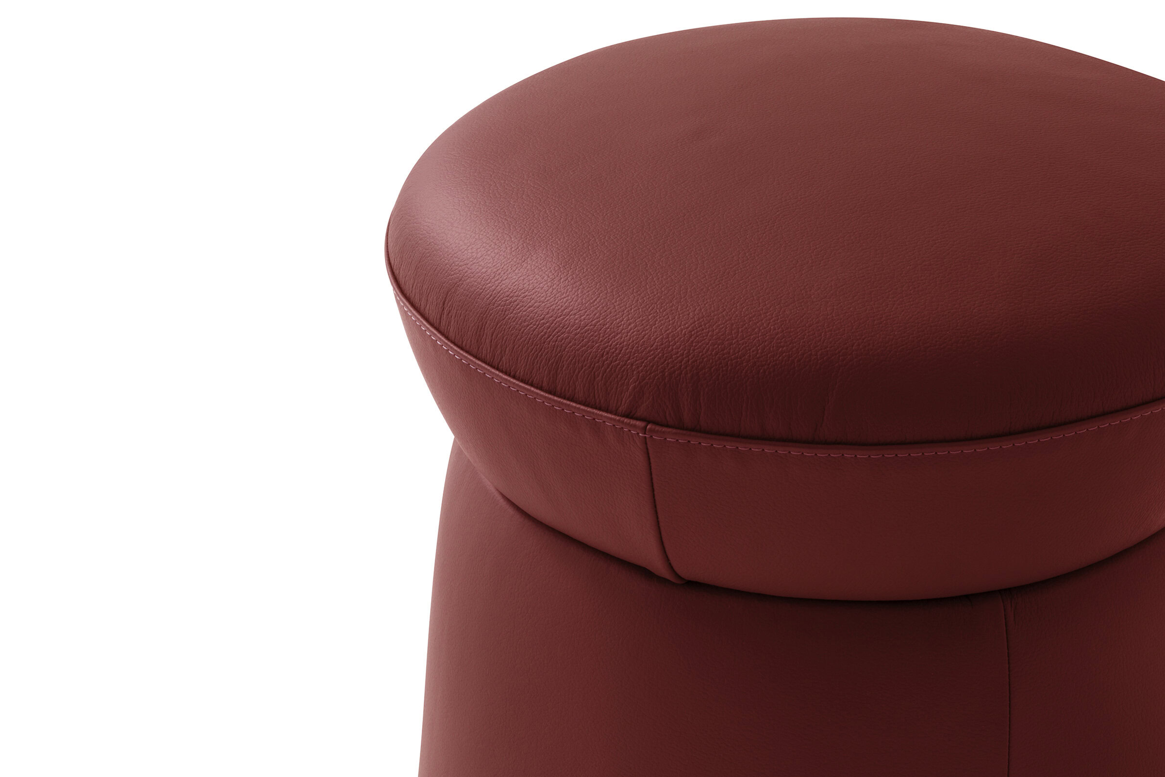 Luxurious red leather ottoman with plush cushioning, perfect for modern living rooms and stylish home decor. Made with high-quality materials for durability and comfort.