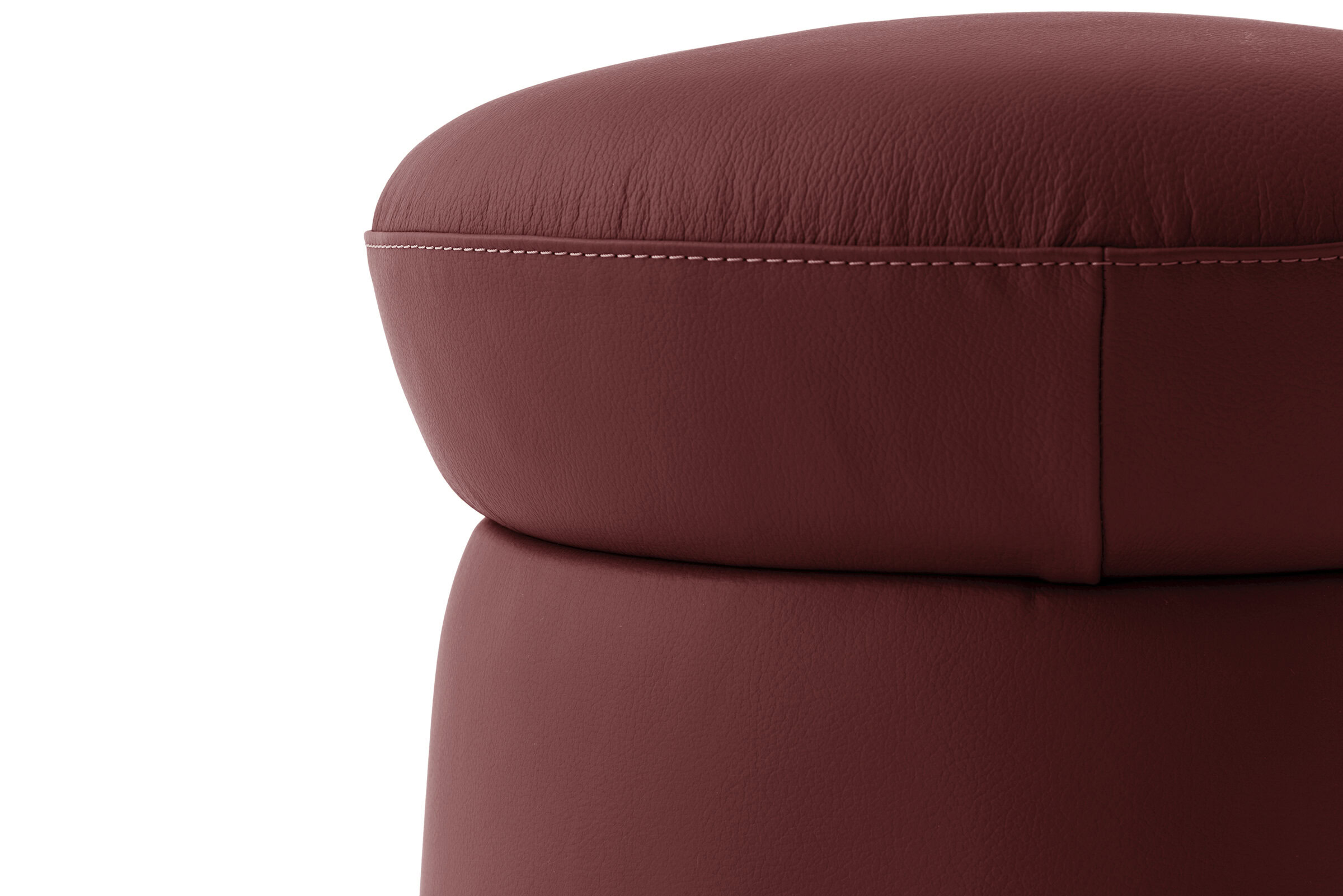 Luxurious red leather upholstered furniture, showcasing high-quality craftsmanship and modern design elements. Perfect for stylish living rooms and contemporary interiors.