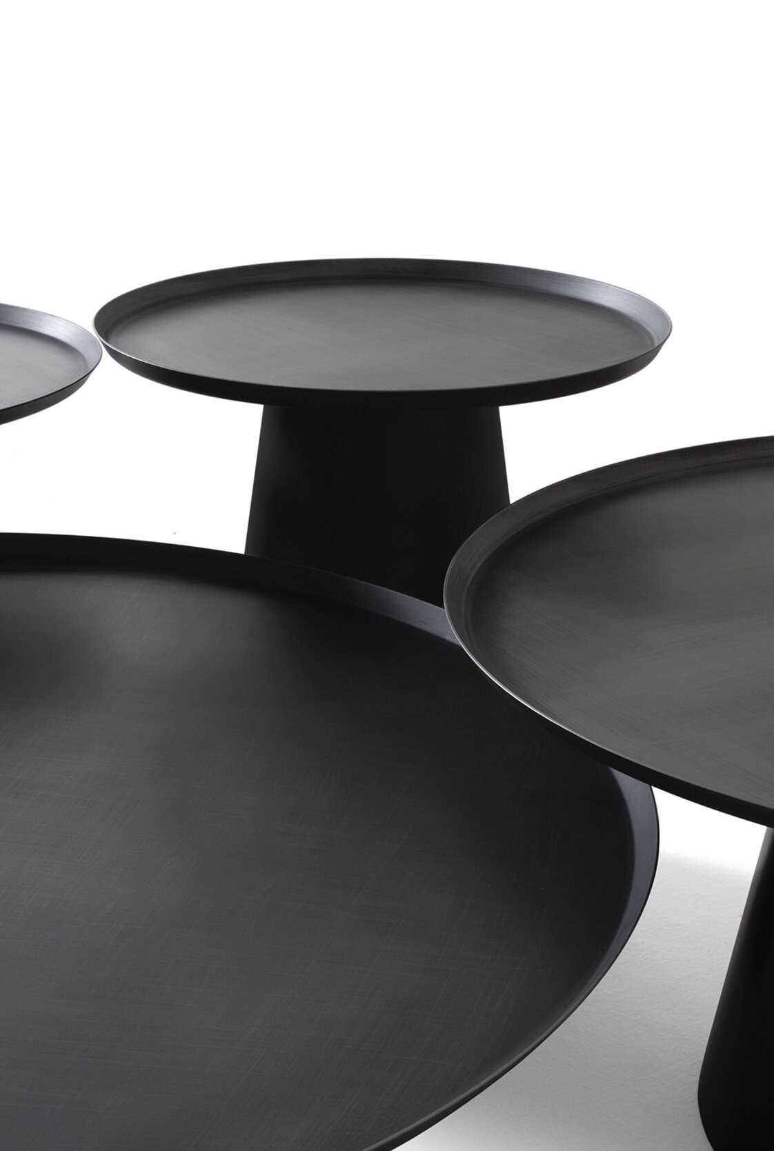 Sleek black modern coffee tables and side tables with minimalist design, perfect for stylish contemporary living room decor.