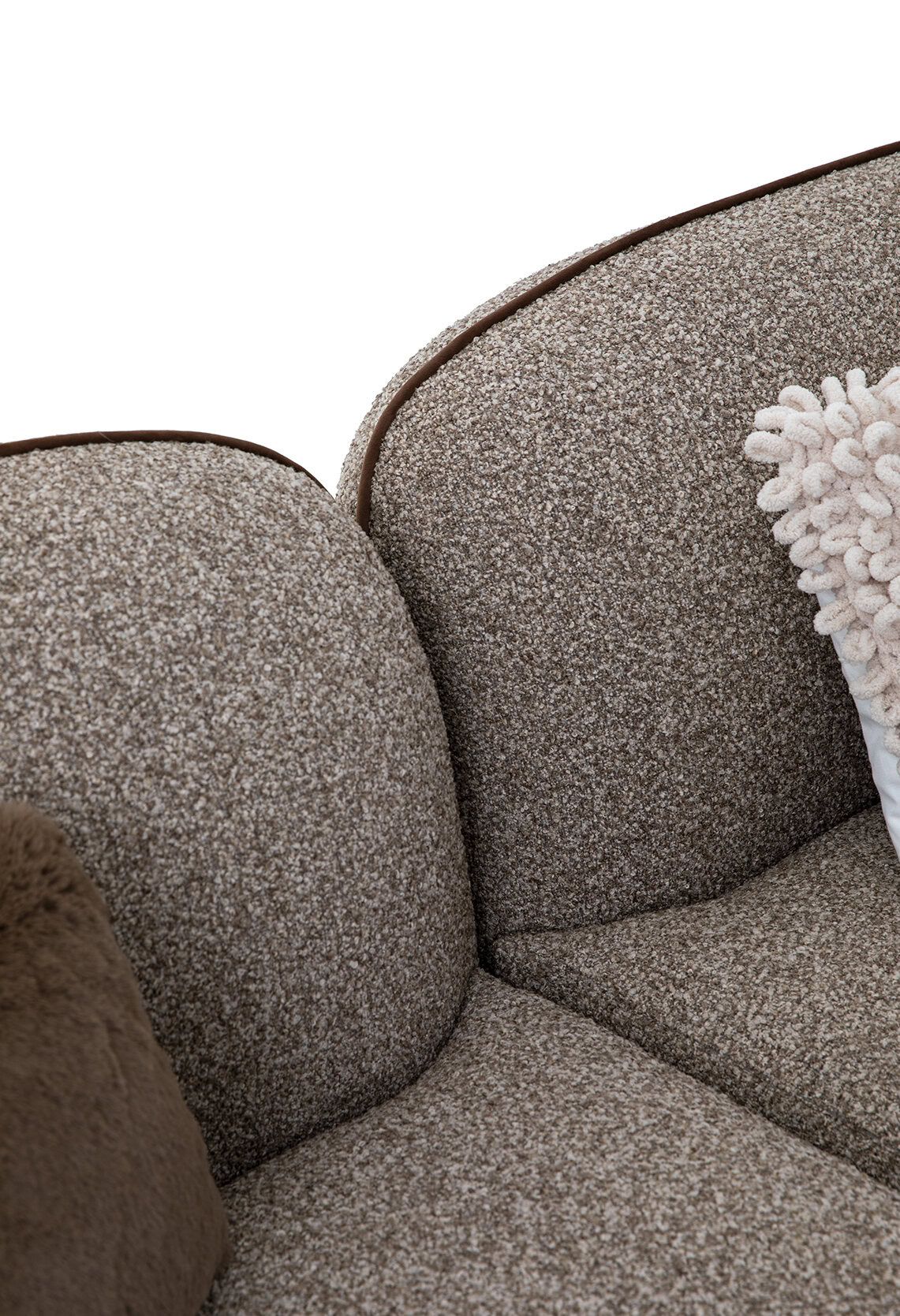 High-quality fabric sofa with textured upholstery, cushioned backrests, and cozy throw pillow, perfect for living rooms seeking comfort and contemporary design.