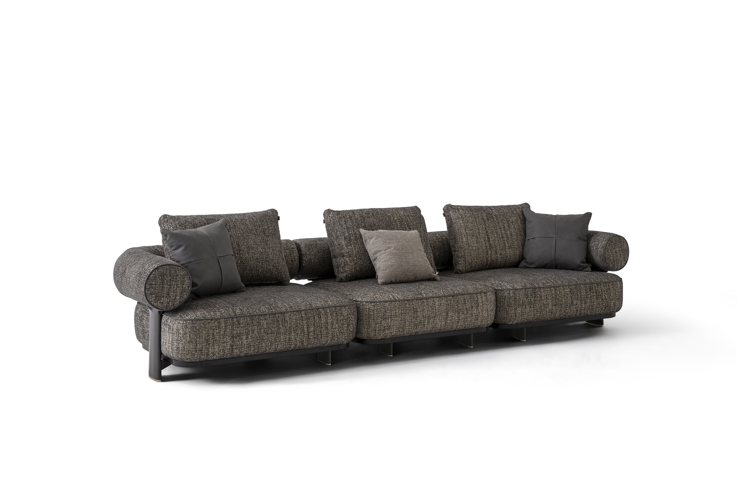 Luxurious dark fabric sofa with plush cushions, stylish rolled arms, and contemporary design, perfect for living rooms.