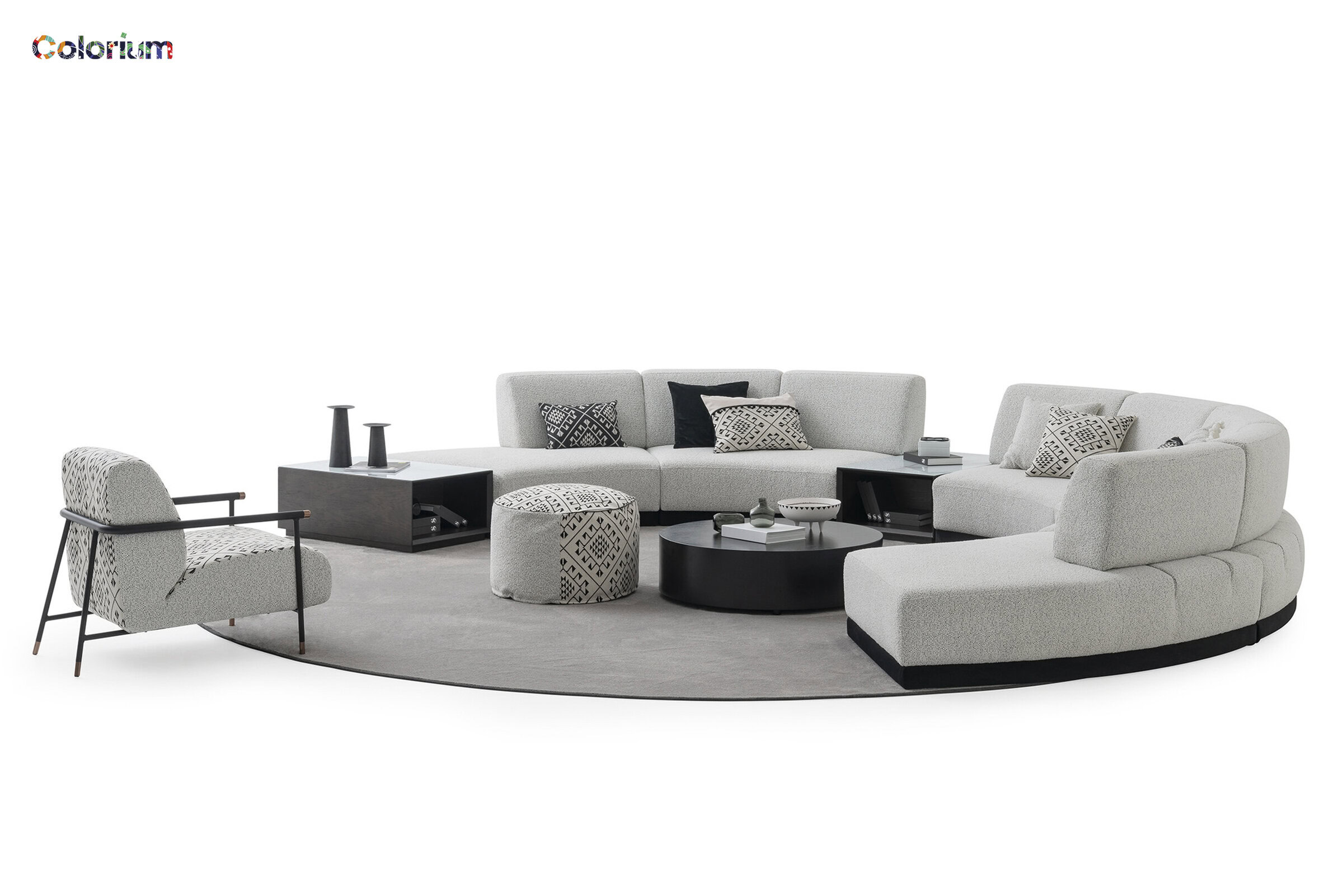 Elegant grey sectional sofa with matching coffee tables and stylish accent chairs, perfect for contemporary living rooms. Crafted for comfort and modern aesthetics.