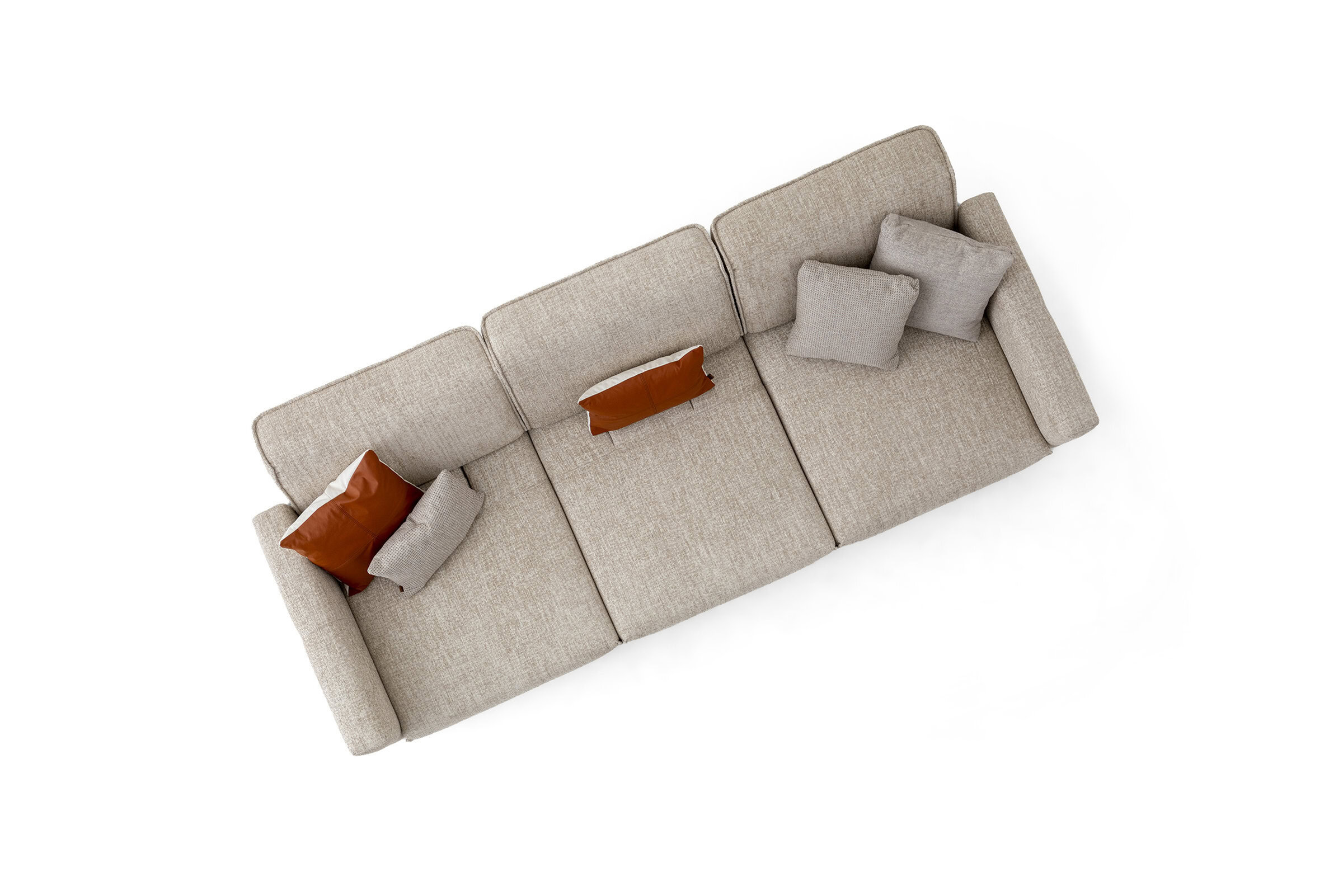 Comfortable beige sofa with multiple cushions, showcasing elegant and cozy furniture design, suitable for contemporary living spaces and interior decor.