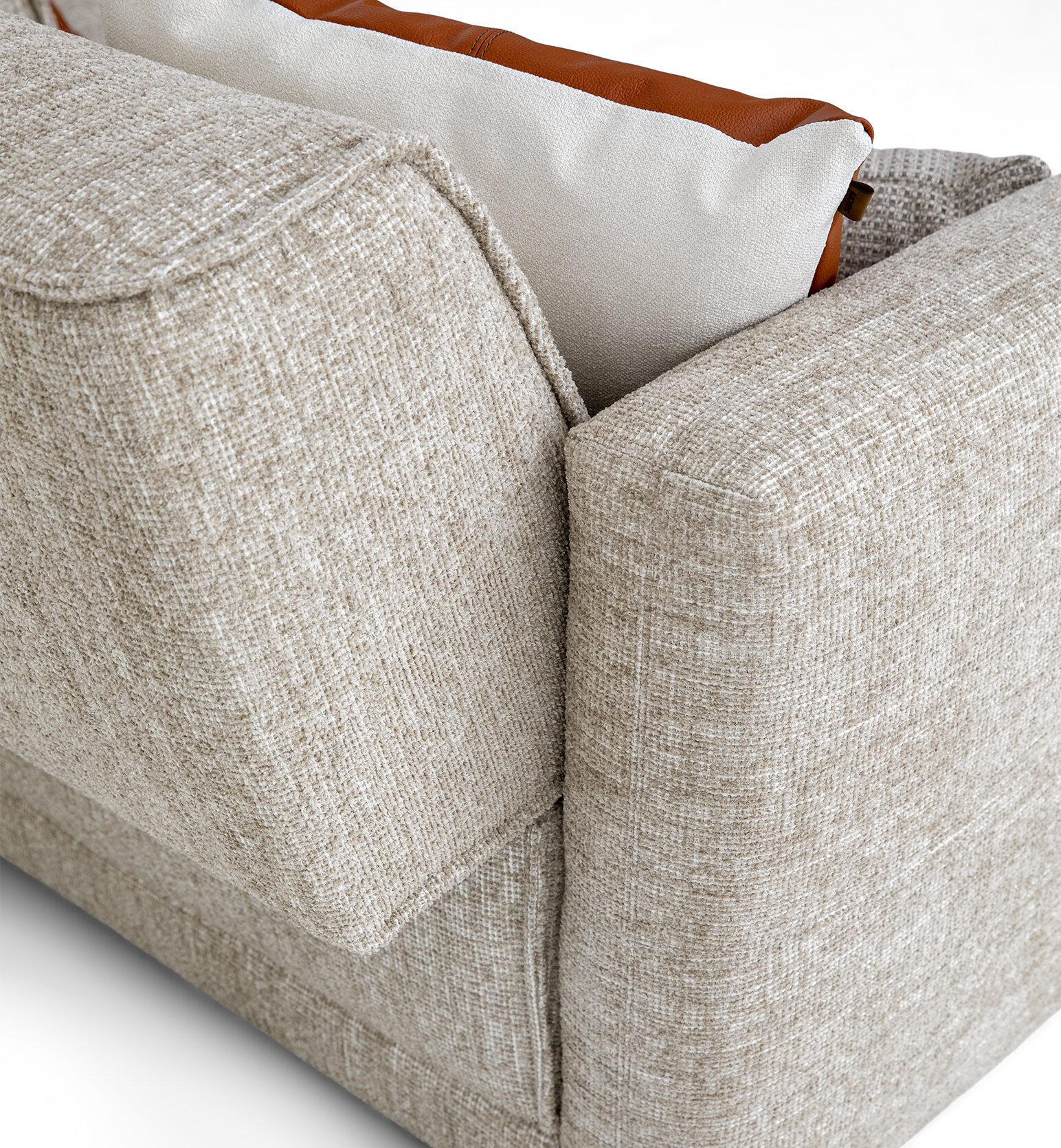 Sophisticated beige textured sofa with comfortable cushions, ideal for contemporary living room décor and lounging ease. Perfect blend of style and comfort.