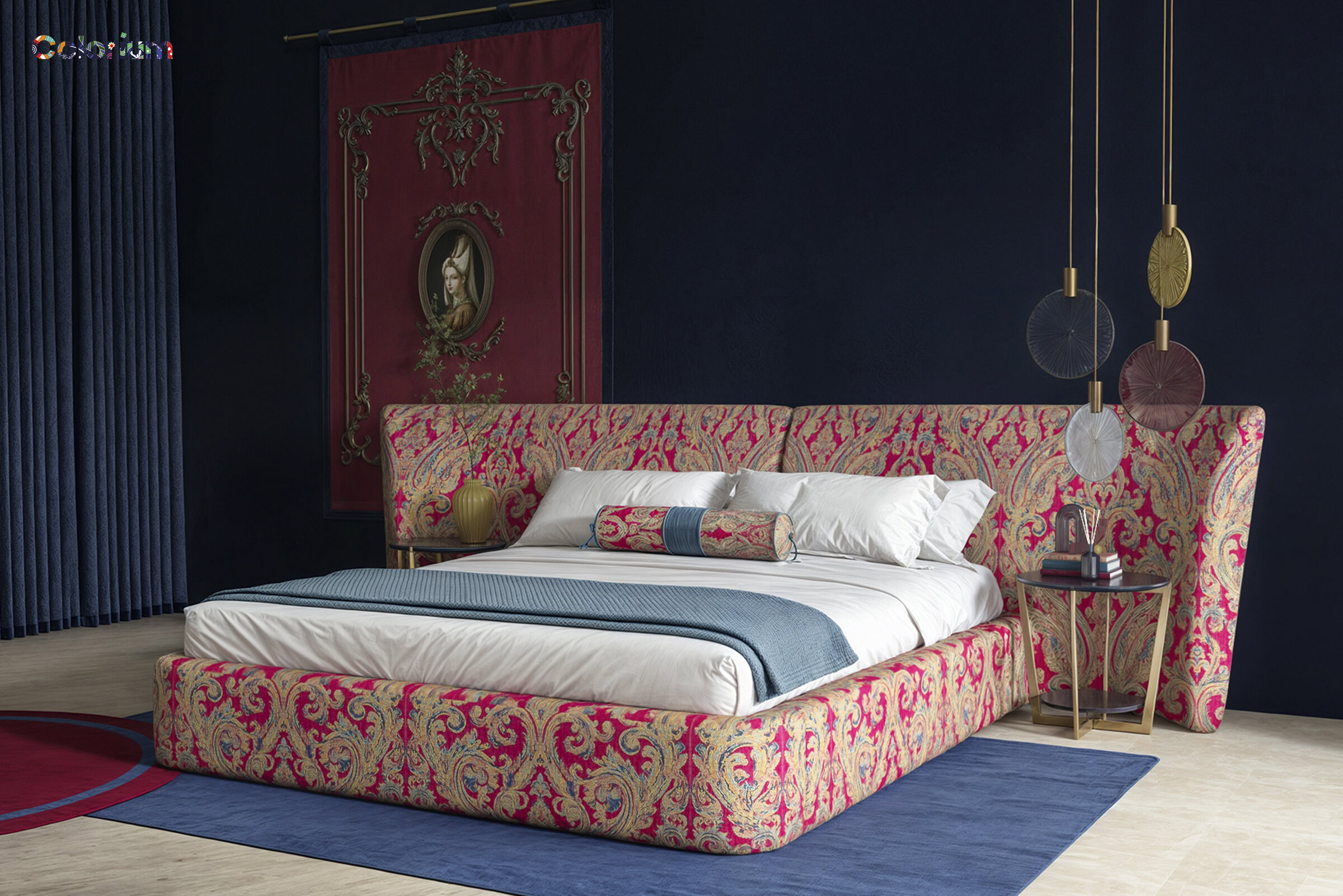 Luxurious velvet bed with an ornate, patterned headboard and matching side panels, set against a dark blue wall with decorative accents for a sophisticated bedroom look.