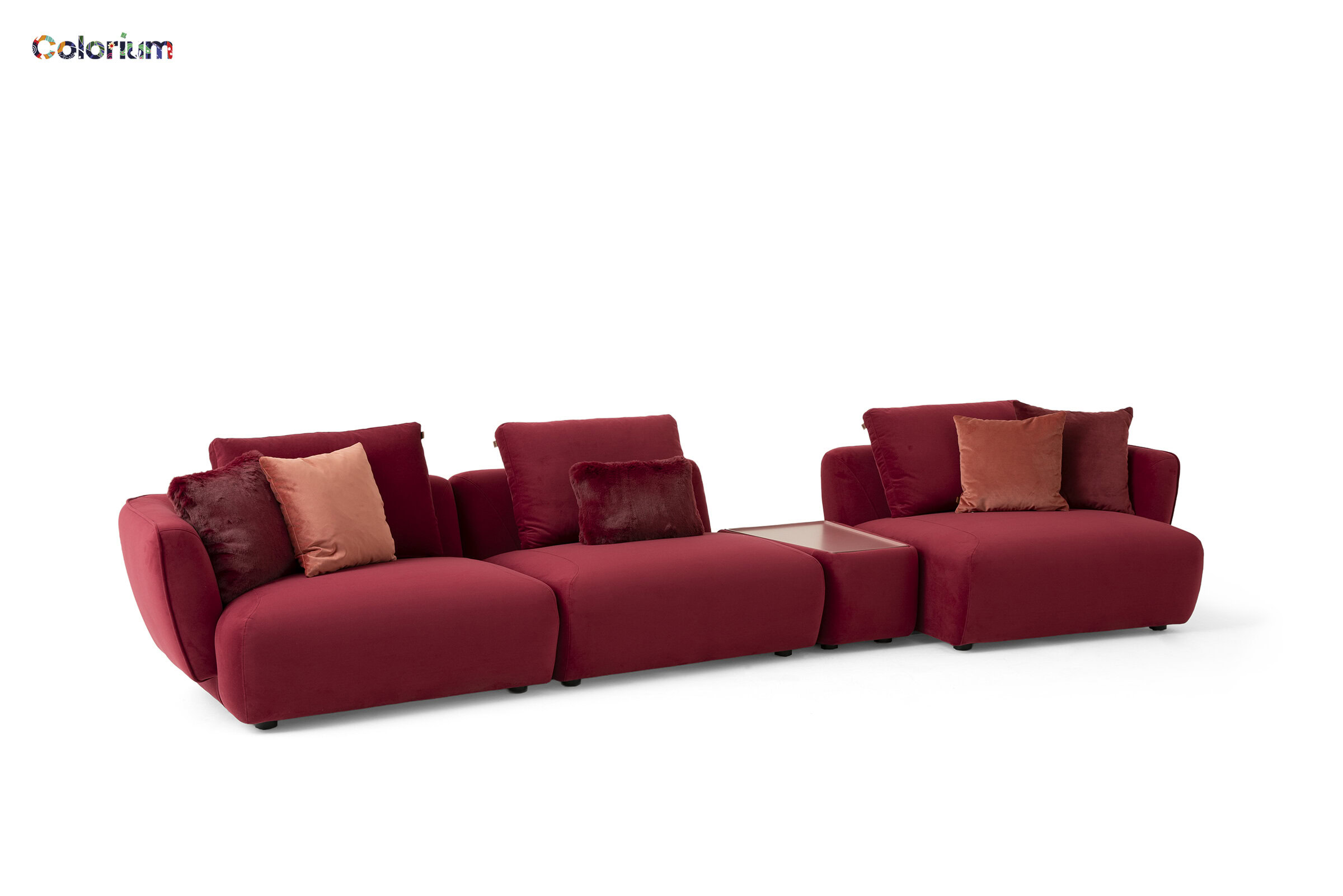 Elegant red modular sofa with plush cushions, perfect for modern living rooms and stylish interiors. Comfortable seating with a contemporary design from Saloni Furniture.