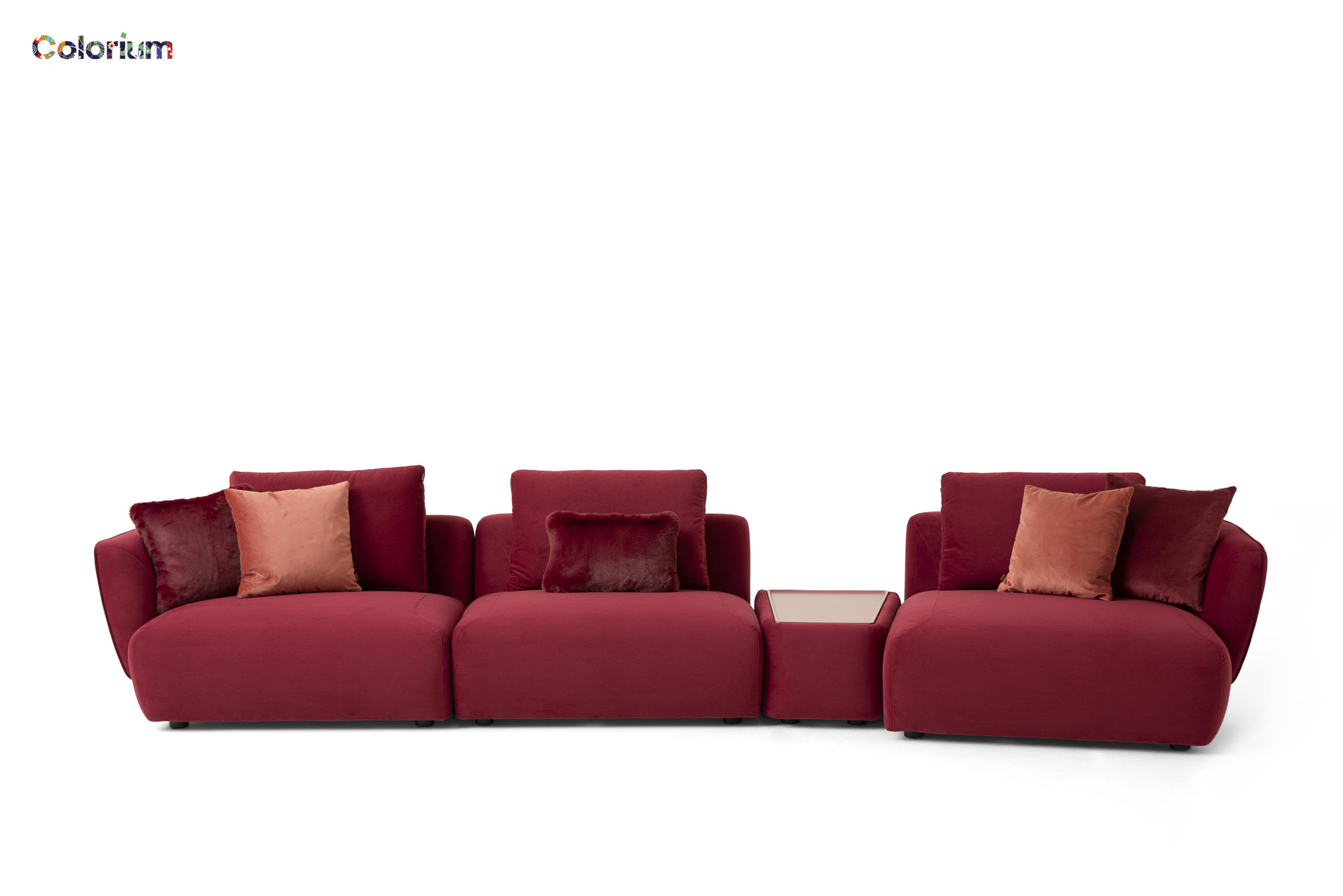 Stylish red sectional sofa with plush cushions, ideal for contemporary living rooms, offering comfort and elegance. Perfect for family gatherings and modern home decor.