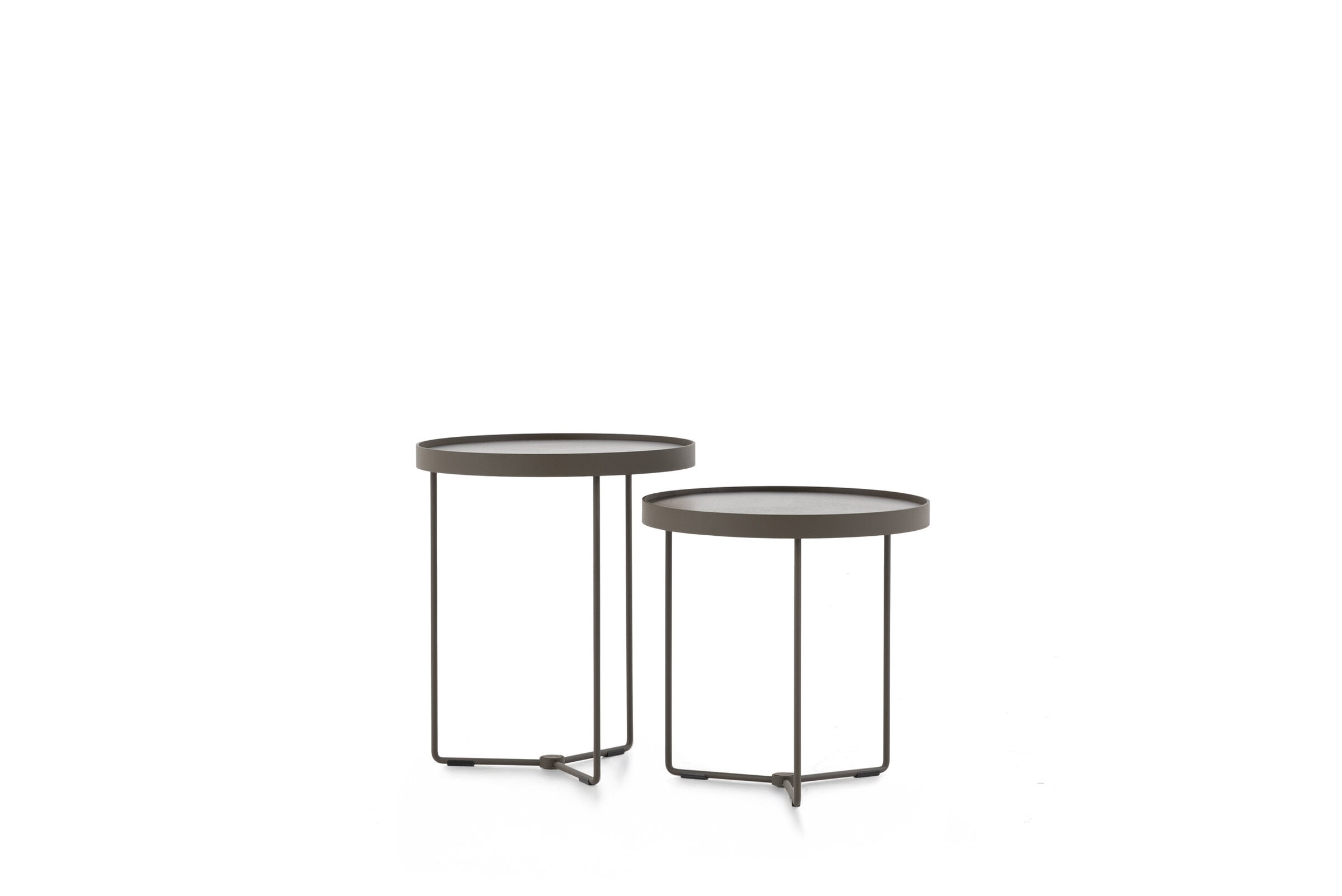 Sleek modern side tables with minimalist black metal frames and round tabletops, perfect for contemporary living room or bedroom decor. Ideal for stylish accent furniture.
