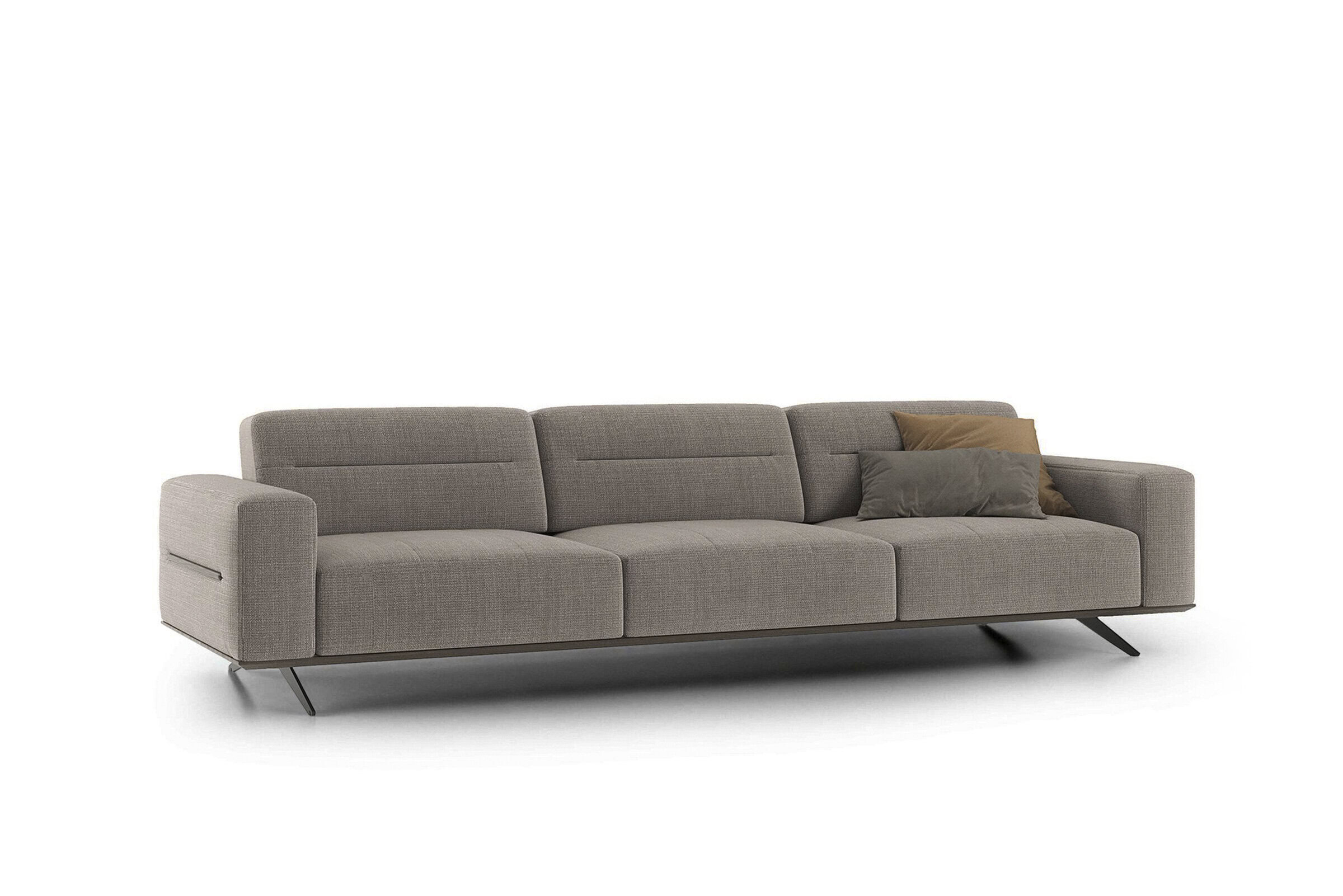 Sofa with modern design, neutral beige upholstery, sleek metal legs, and plush cushions for contemporary living room decor.