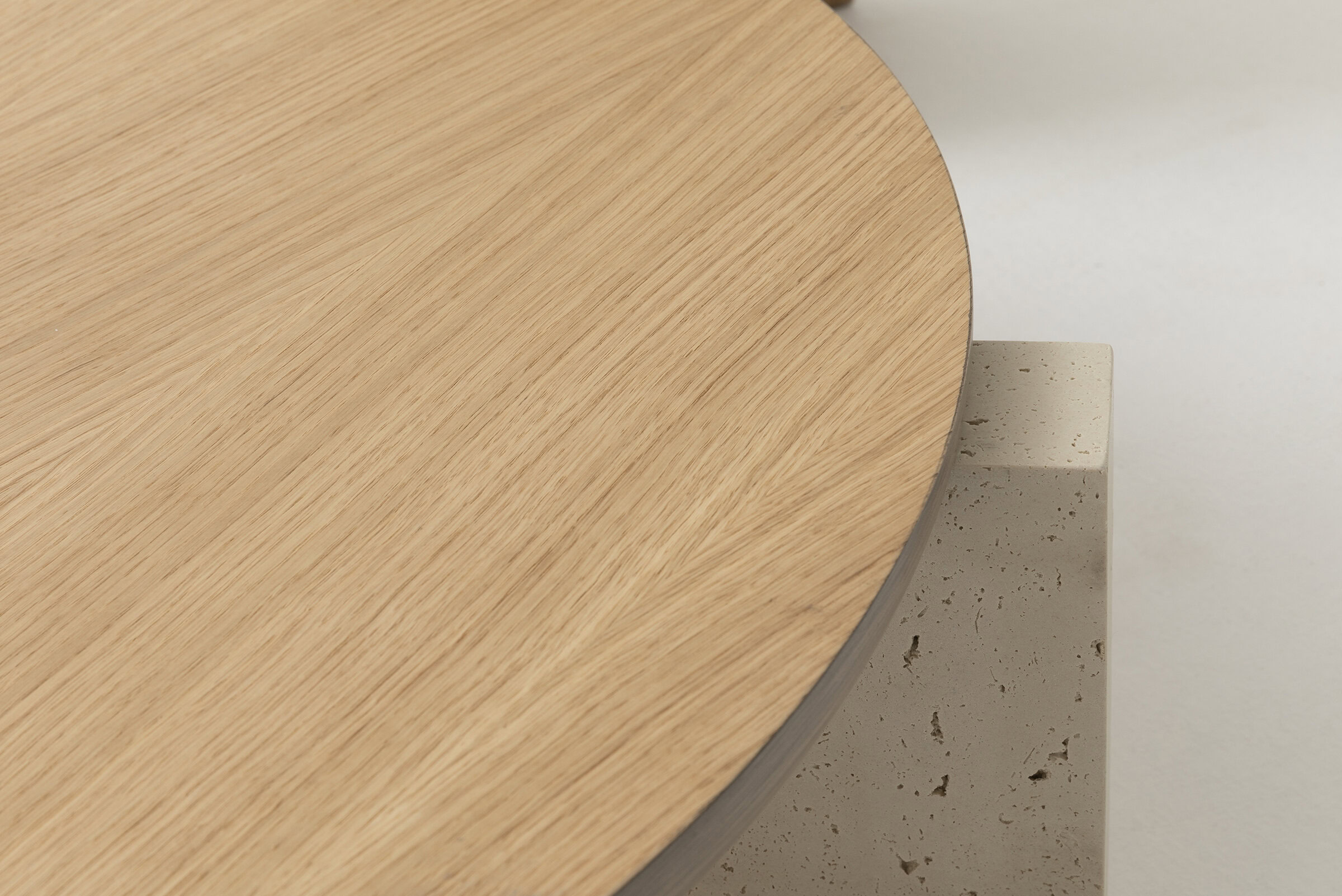 Sleek wooden tabletop with a natural finish on a modern furniture piece showcasing minimalist design and high-quality craftsmanship.