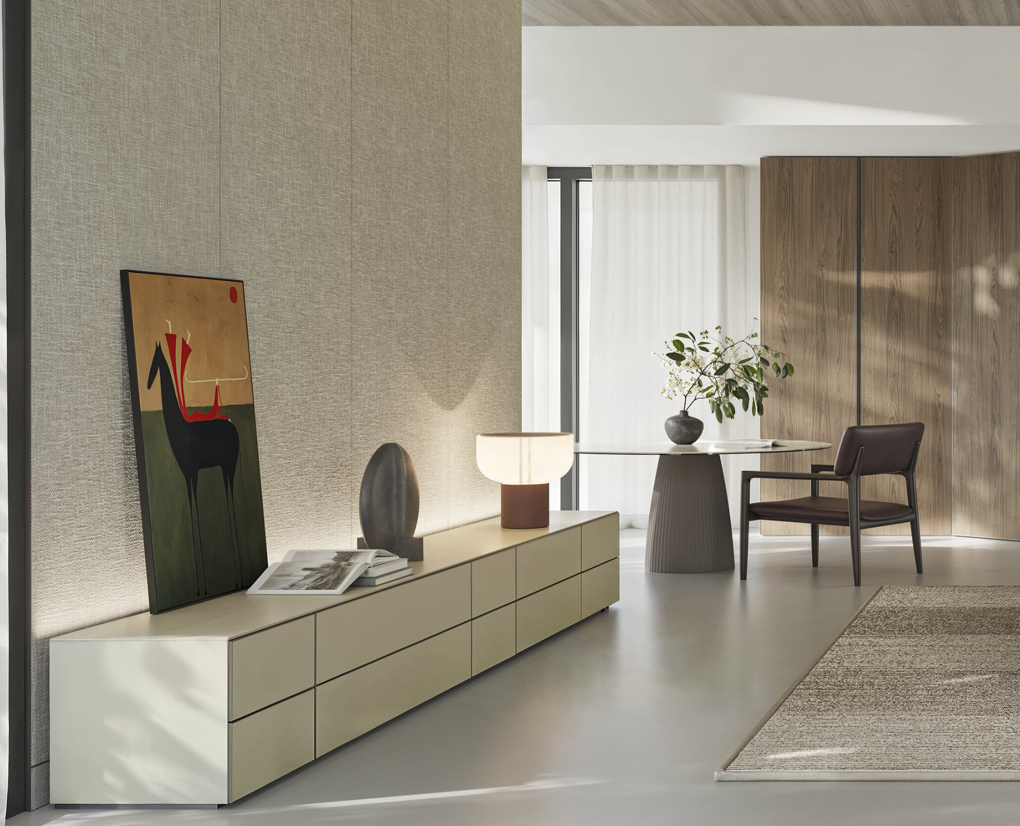 Sleek modern living room with stylish furniture, beige sideboard, decorative items, reading lamp, coffee table with plant, and cozy ambient lighting in a minimalist interior design.