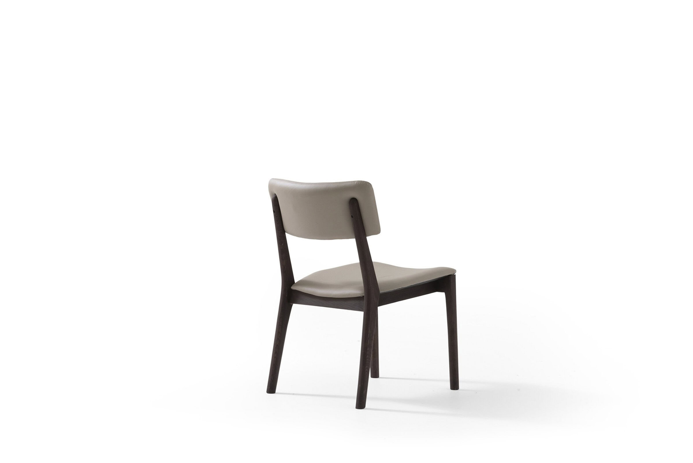 Elegant modern dining chair with dark wooden frame and beige upholstered seat and backrest, perfect for stylish kitchens and dining areas.