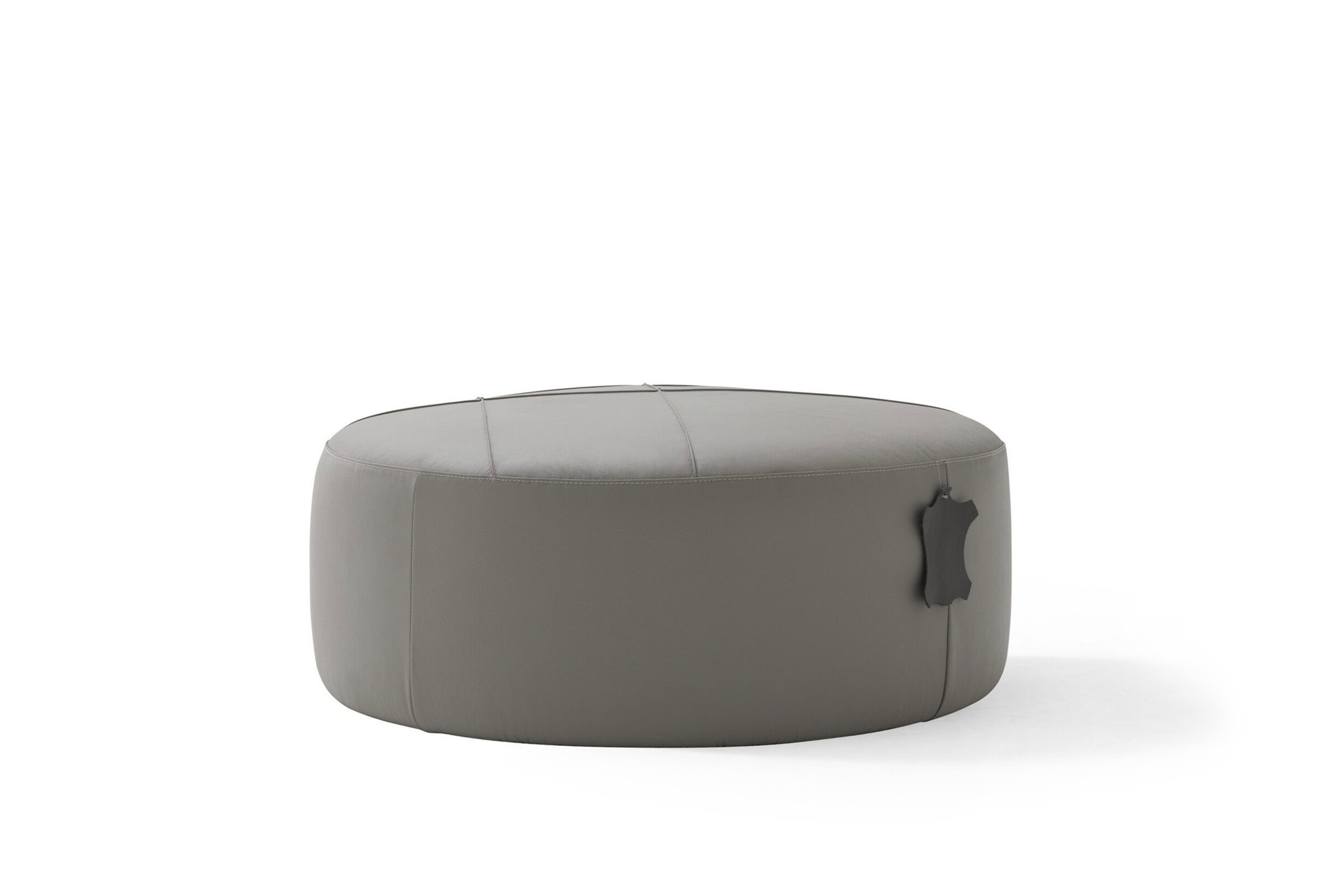 Luxurious gray leather ottoman with branded logo accents, perfect for modern living room decor and stylish seating solutions. Adds elegance and comfort to any space.