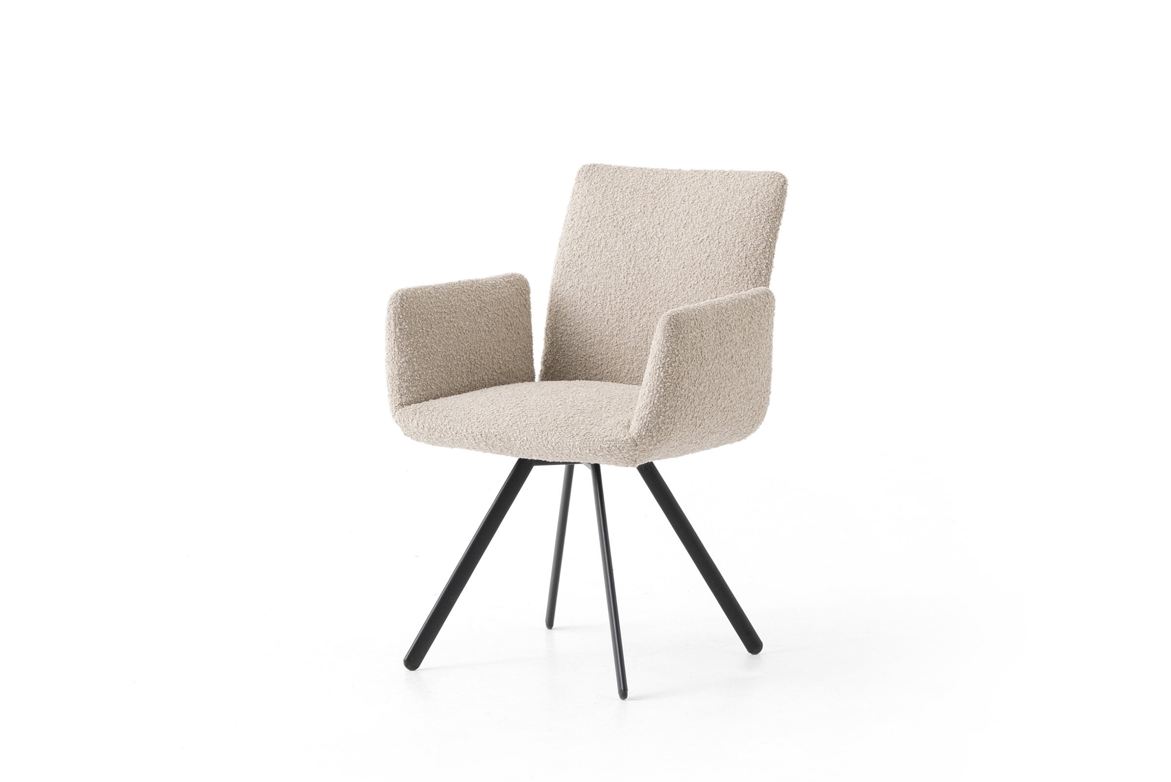 Stylish beige upholstered armchair with black metal legs, perfect for contemporary living rooms and offices, combining comfort and modern design.